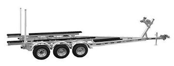 Side view of a trailer with three pairs of wheels